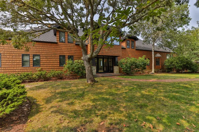 a view of a chairs and table in patio