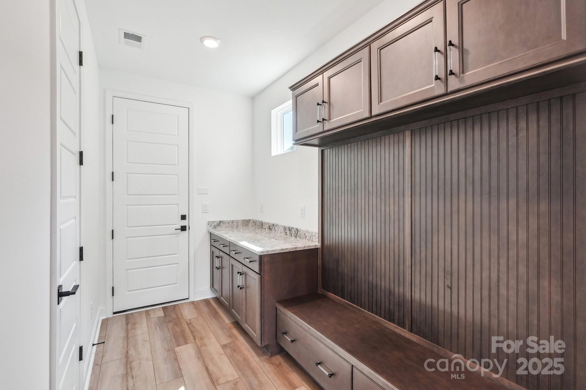 604 Hyder Trail Tega Cay, SC 29708 - Photo 12 of 44 a kitchen with a sink and cabinets