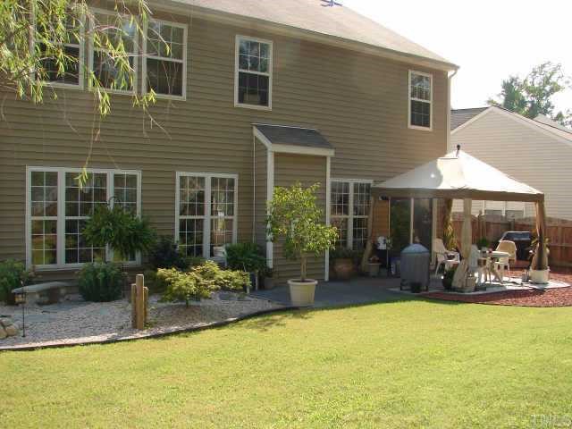 106 Grassy Point Road Apex, NC 27502 - Photo 2 of 10 Great backyard for relaxing or entertaining
