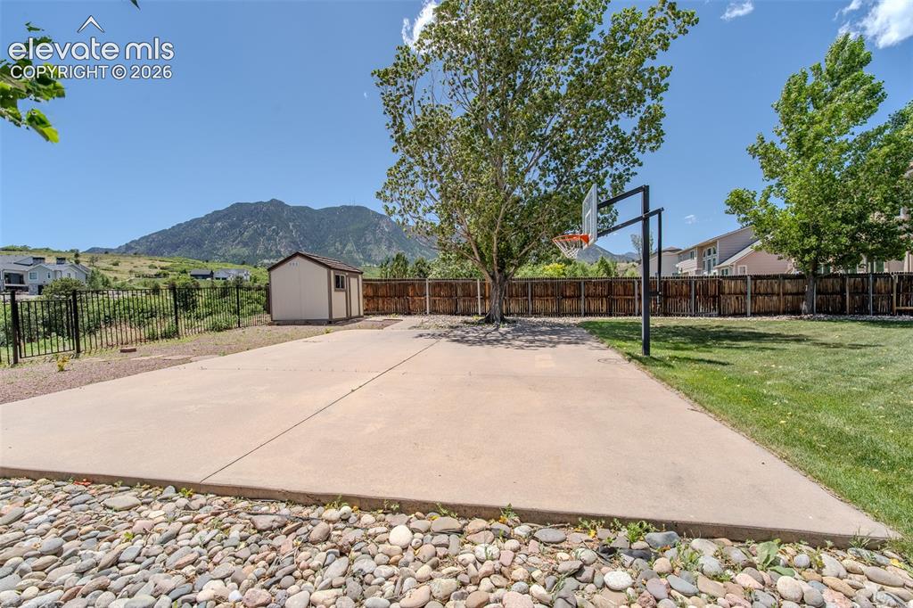 789 Capeglen Road Colorado Springs, CO 80906 - Photo 8 of 46 Basketball court w/ views of open space and mountains