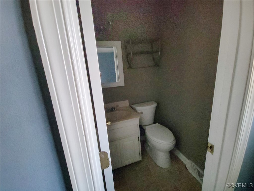 15604 Exter Mill Road Chesterfield, VA 23838 - Photo 21 of 22 a white toilet sitting next to a sink