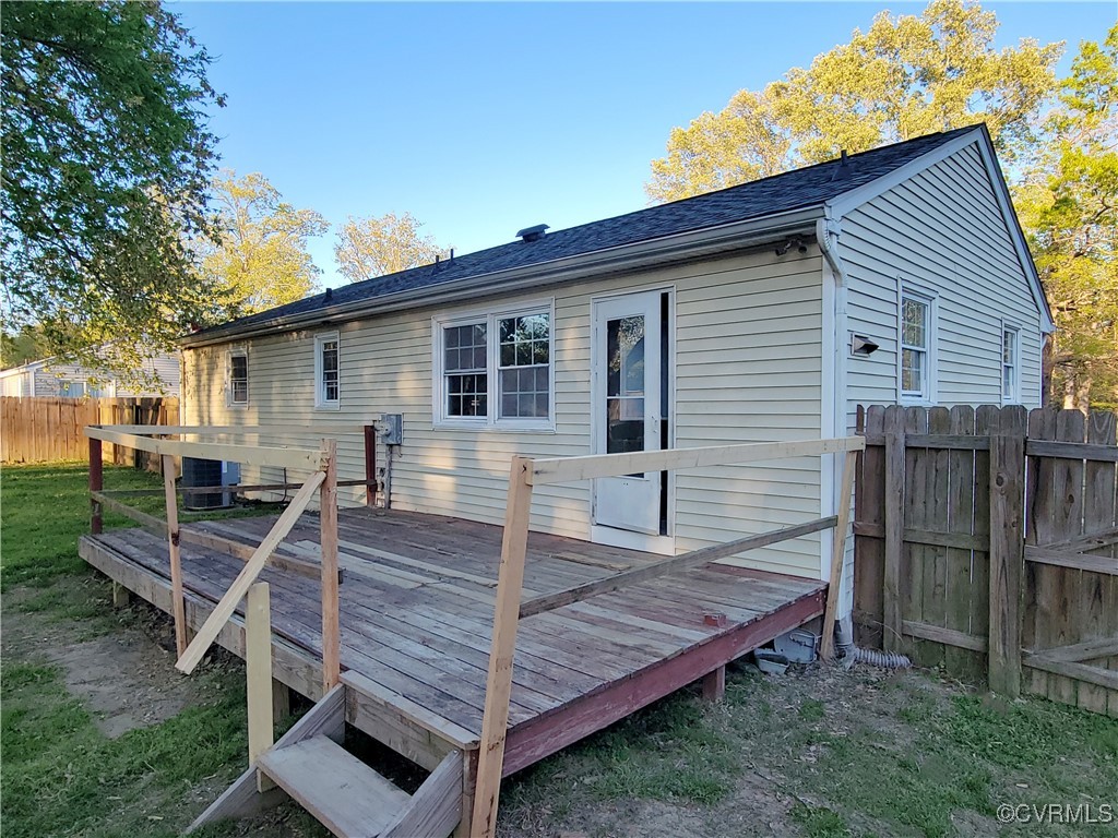 15604 Exter Mill Road Chesterfield, VA 23838 - Photo 4 of 22 a view of a wooden chairs and table in the backyard