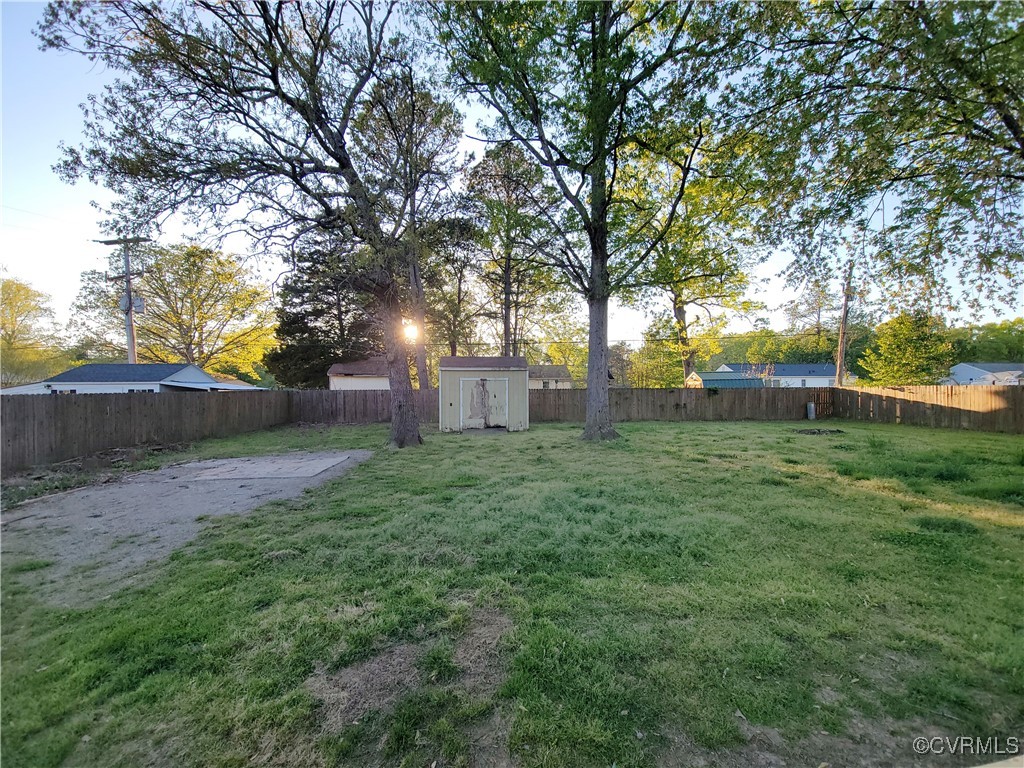 15604 Exter Mill Road Chesterfield, VA 23838 - Photo 7 of 22 a view of a backyard with large trees