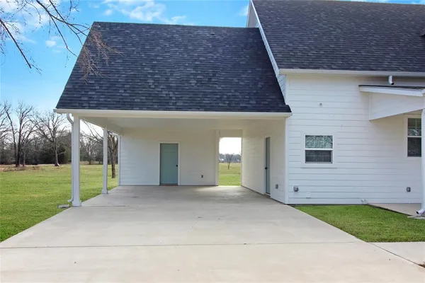 a view of a house with a porch
