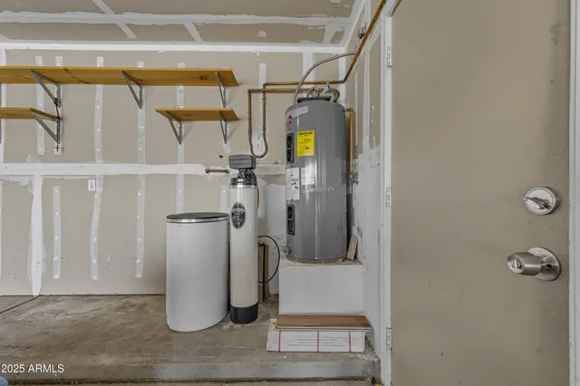 a view of a patio with table and chairs potted plants with wooden floor