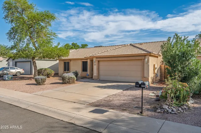 a front view of house with yard