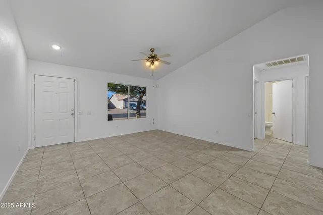 an aerial view of a house with a lake view