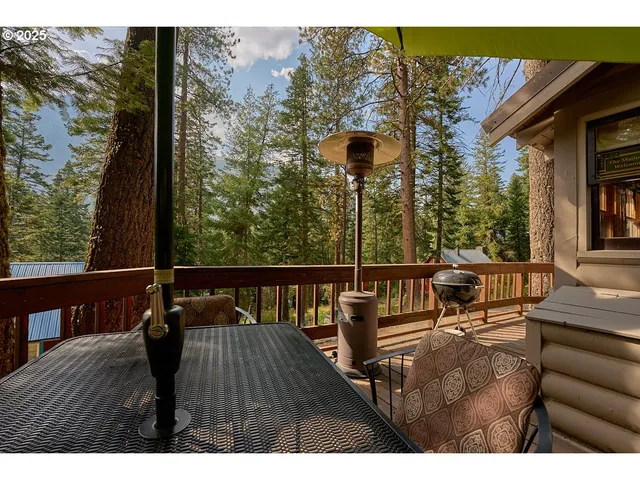 a view of a balcony with chairs