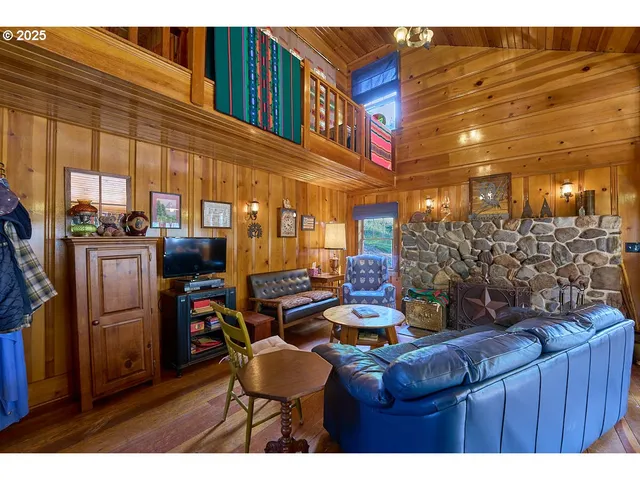 a outdoor living space with patio furniture and outdoor kitchen