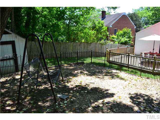 309 Glascock Street Raleigh, NC 27604 - Photo 23 of 23 a backyard of a house with lots of green space