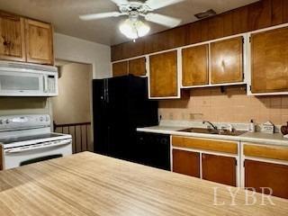 32 Pine Drive Lynchburg, VA 24502 - Photo 11 of 30 a kitchen with a stove and a refrigerator
