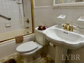 32 Pine Drive Lynchburg, VA 24502 - Photo 14 of 30 a bathroom with a sink toilet and shower
