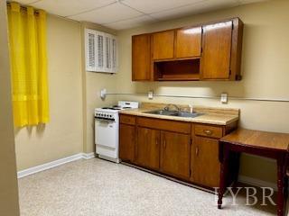 32 Pine Drive Lynchburg, VA 24502 - Photo 17 of 30 a kitchen with a sink cabinets and chair