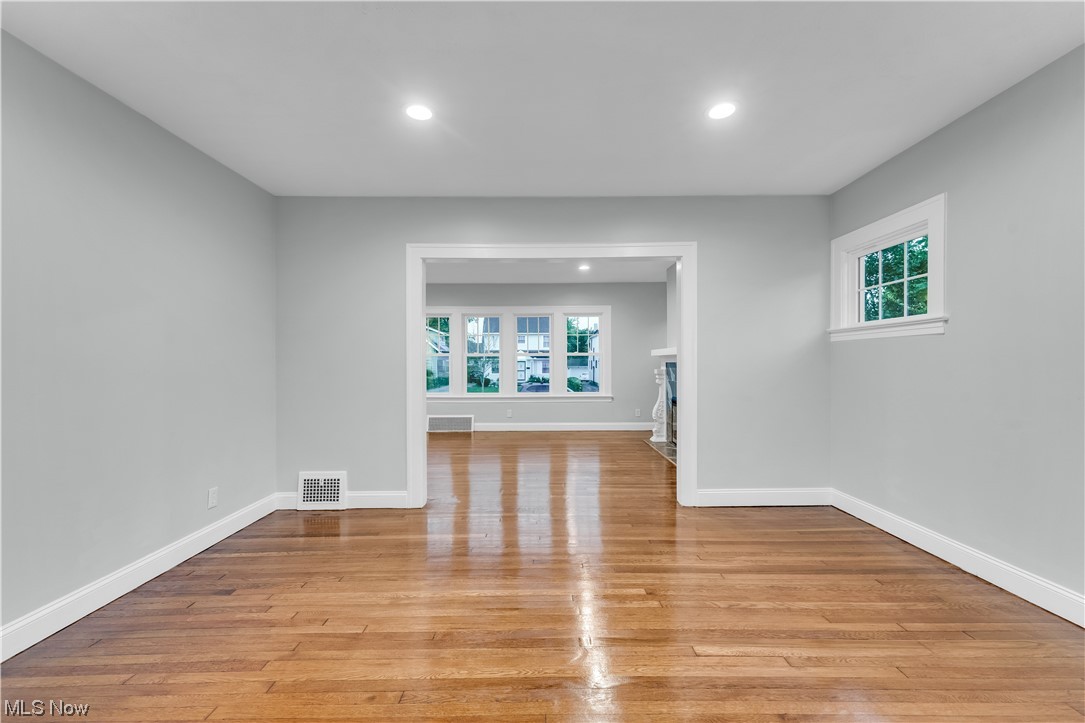 3445 Menlo Road Cleveland, OH 44120 - Photo 9 of 35 Hardwood floored spare room with a wealth of natural light