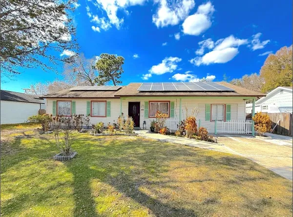 a front view of a house with a patio