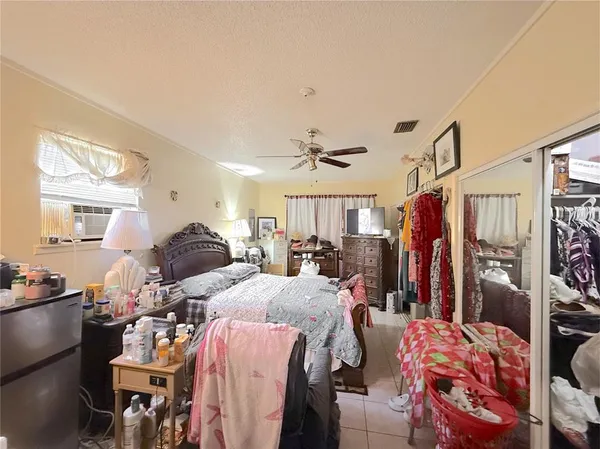 a bed room with a bed and a furniture