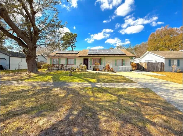 a view of a house with a swimming pool