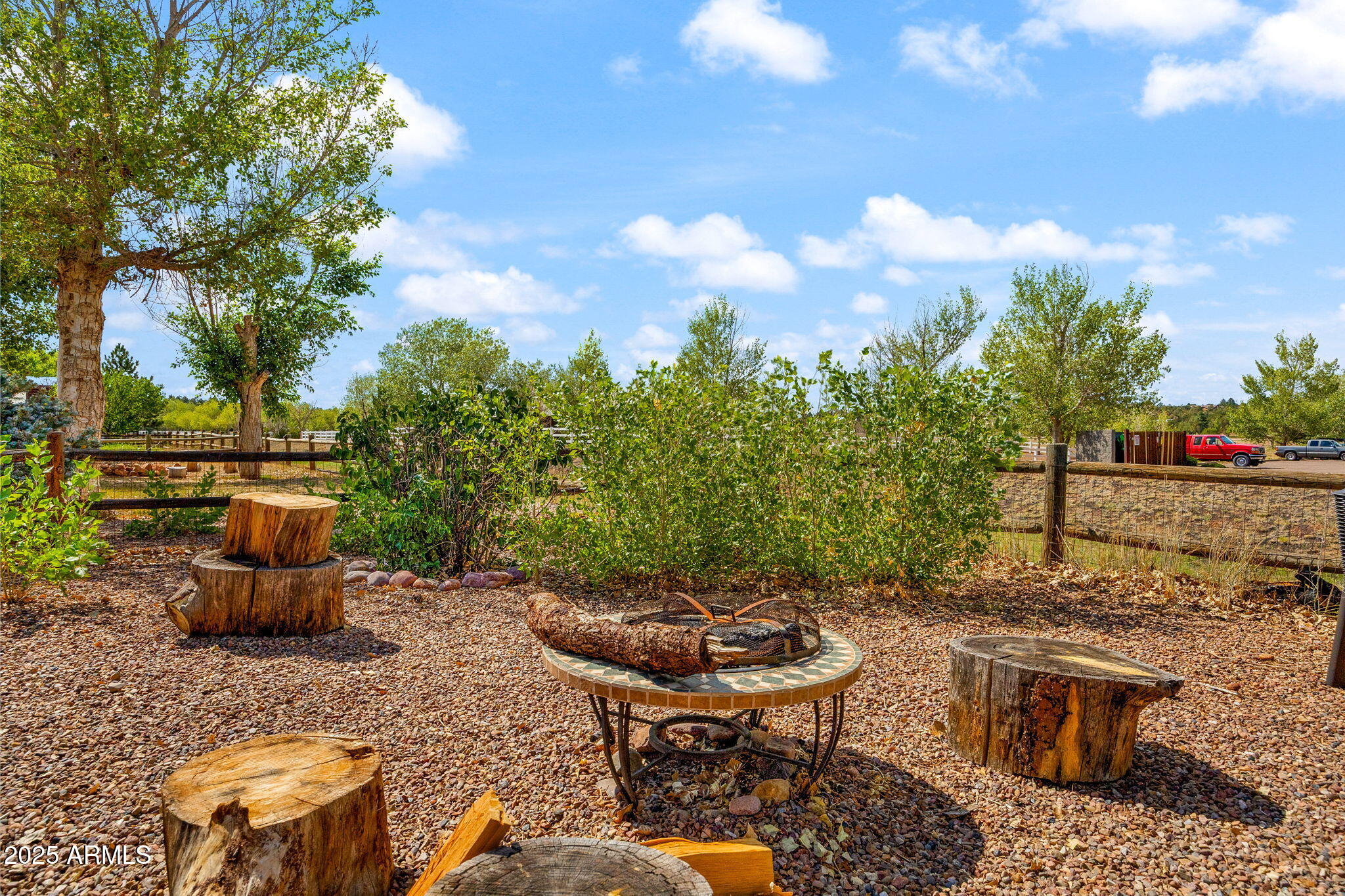 2344 Buffalo Loop Overgaard, AZ 85933 - Photo 22 of 30 a view of a backyard with sitting area