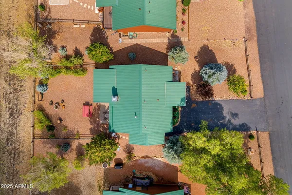 an aerial view of a house with a garden