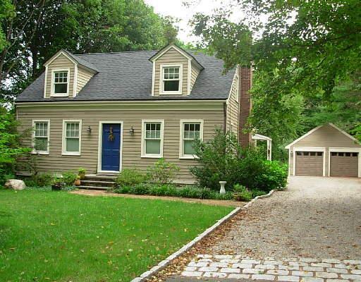 70 New Street Ridgefield, CT 06877 - Photo 1 of 1 a front view of a house with a yard