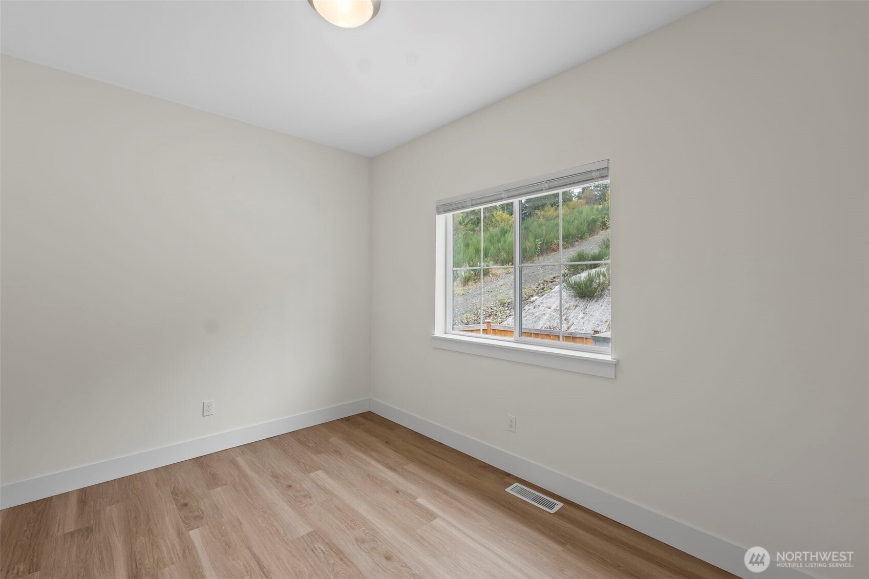 19013 Highway 3, Unit AB Allyn, WA 98524 - Photo 32 of 36 an empty room with a window