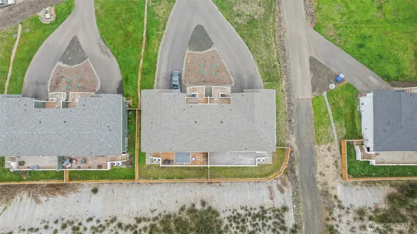 an aerial view of a house with garden