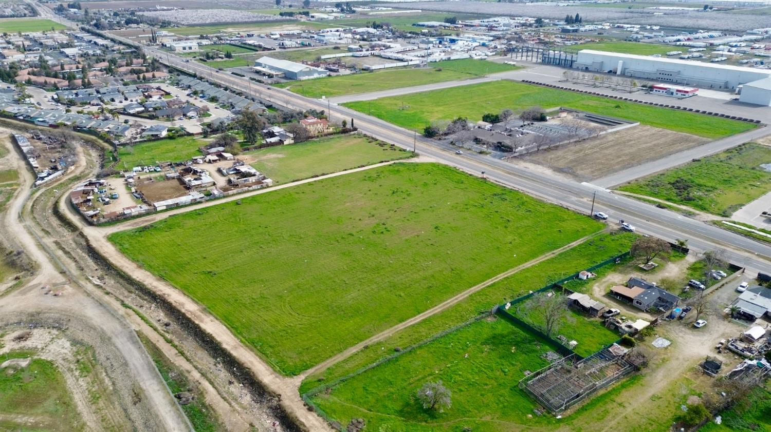 swimming pool with a garden view