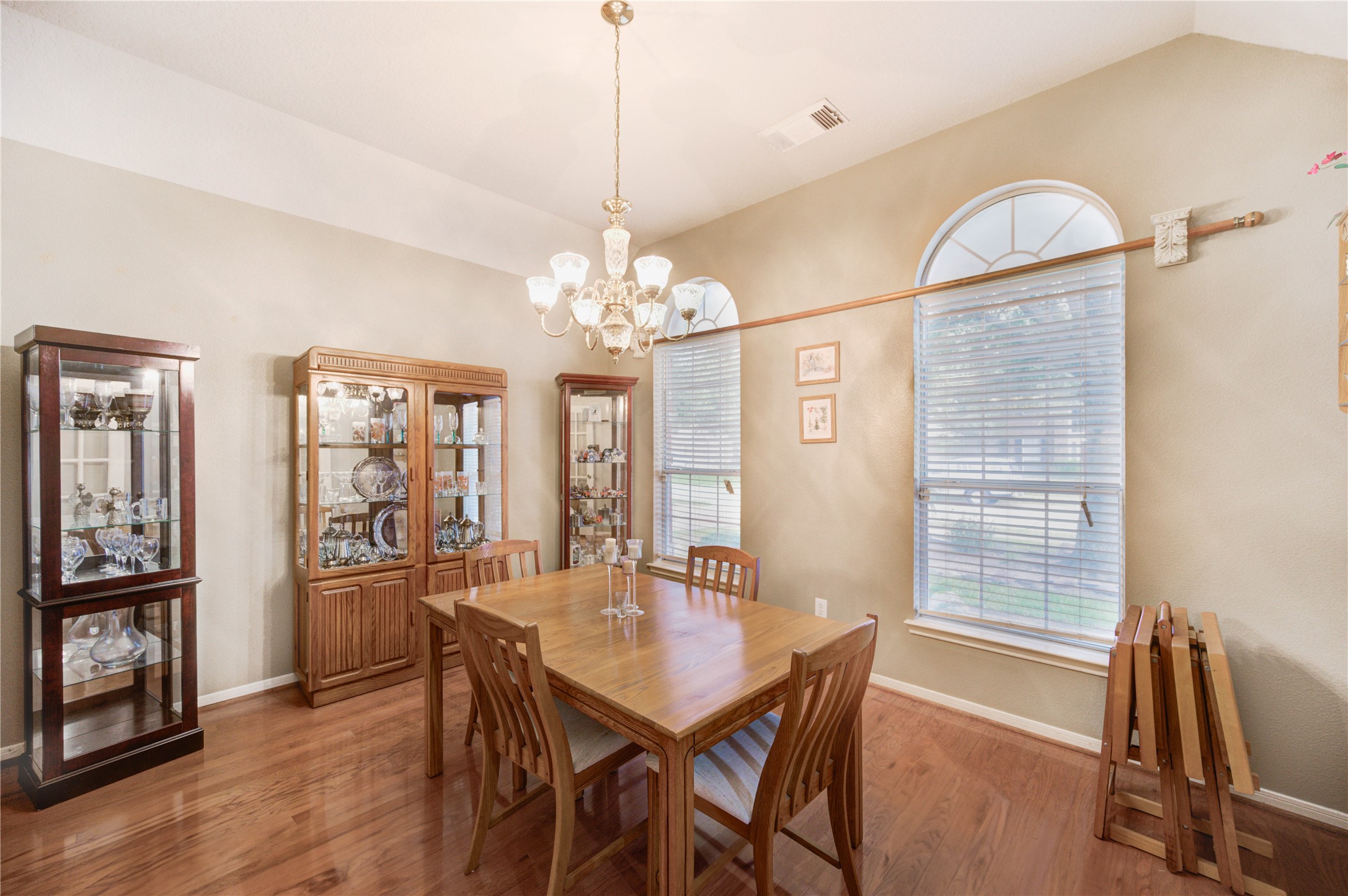 16730 Spring Barker Drive Cypress, TX 77429 - Photo 31 of 50 a view of a dining room with furniture and wooden floor
