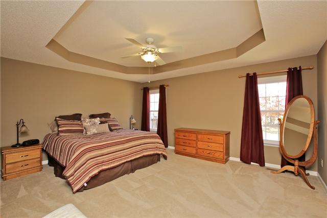 617 Blue Ridge Drive Columbia, TN 38401 - Photo 11 of 19 Spacious Master Bedroom with tray ceiling and double windows that gives a view of the secluded backyard.