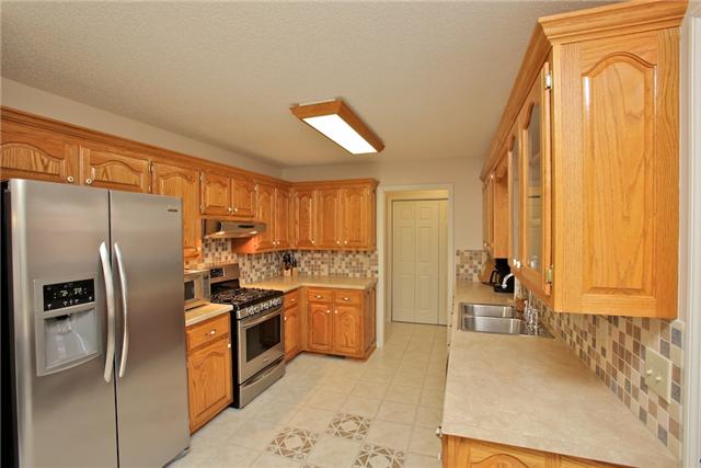 617 Blue Ridge Drive Columbia, TN 38401 - Photo 6 of 19 Notice the designed tile floor! Laundry area is located adjacent to kitchen.