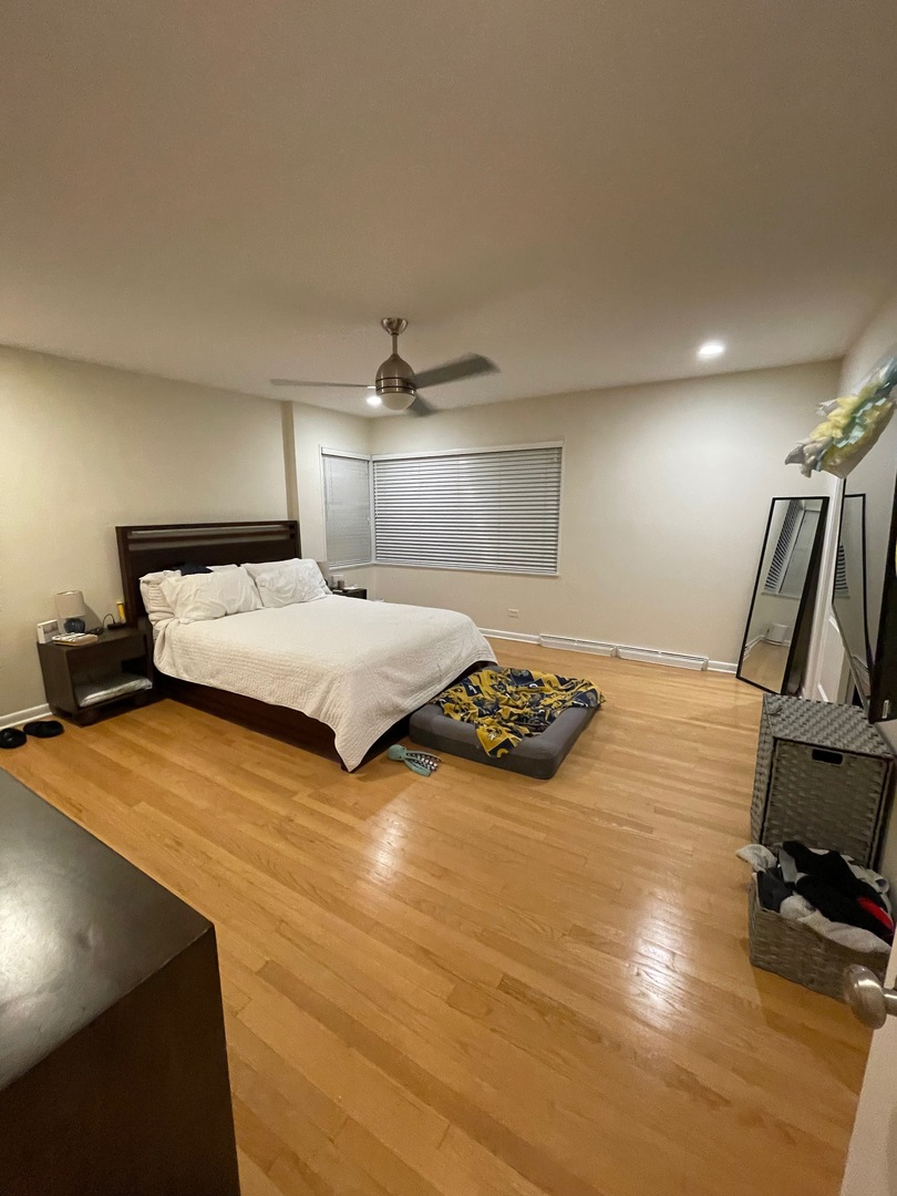 539.5 Ridge Road Wilmette, IL 60091 - Photo 9 of 11 a bedroom with a bed and a view of bathroom