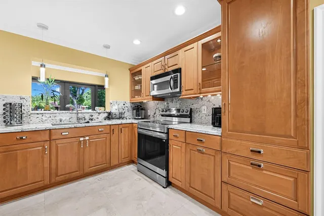 a bedroom with a bed and a dresser in it