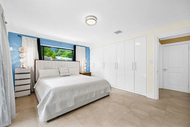 a living room with furniture flat screen tv and a fireplace