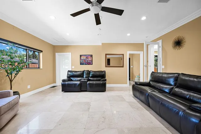 a view of a house with a backyard and a patio