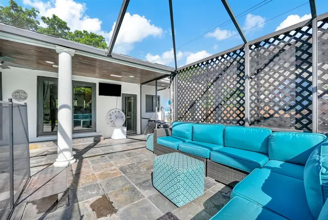an aerial view of a house with a garden