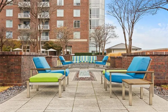 a view of a chairs and a tables in the patio