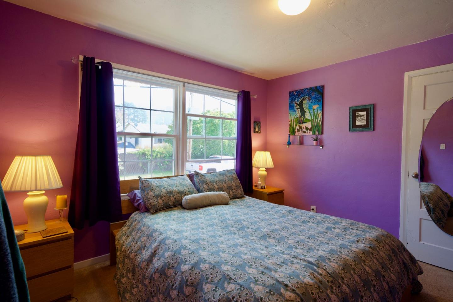 390 Pacific Avenue Pacifica, CA 94044 - Photo 14 of 24 a bedroom with a bed and a window