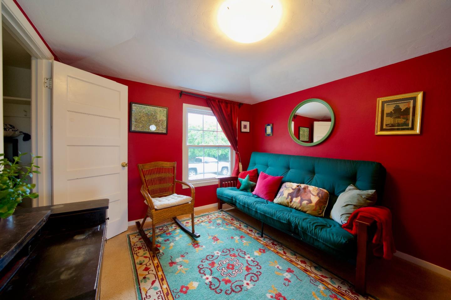 390 Pacific Avenue Pacifica, CA 94044 - Photo 16 of 24 a living room with furniture and a rug