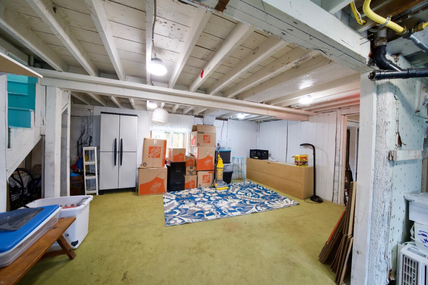 390 Pacific Avenue Pacifica, CA 94044 - Photo 17 of 24 a bed room with a bed and a television