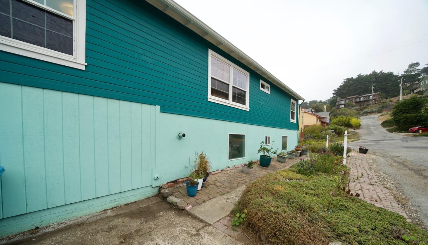 390 Pacific Avenue Pacifica, CA 94044 - Photo 22 of 24 a backyard of a house