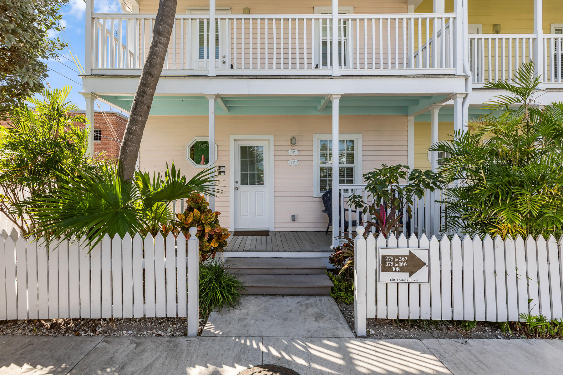 620 Thomas Street, Unit 175 Key West, FL 33040 - Photo 5 of 30 a front view of a house with a garden