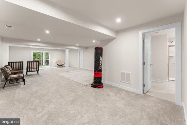 a view of a livingroom with furniture and wooden floor