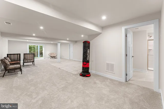 a view of a livingroom with furniture and wooden floor