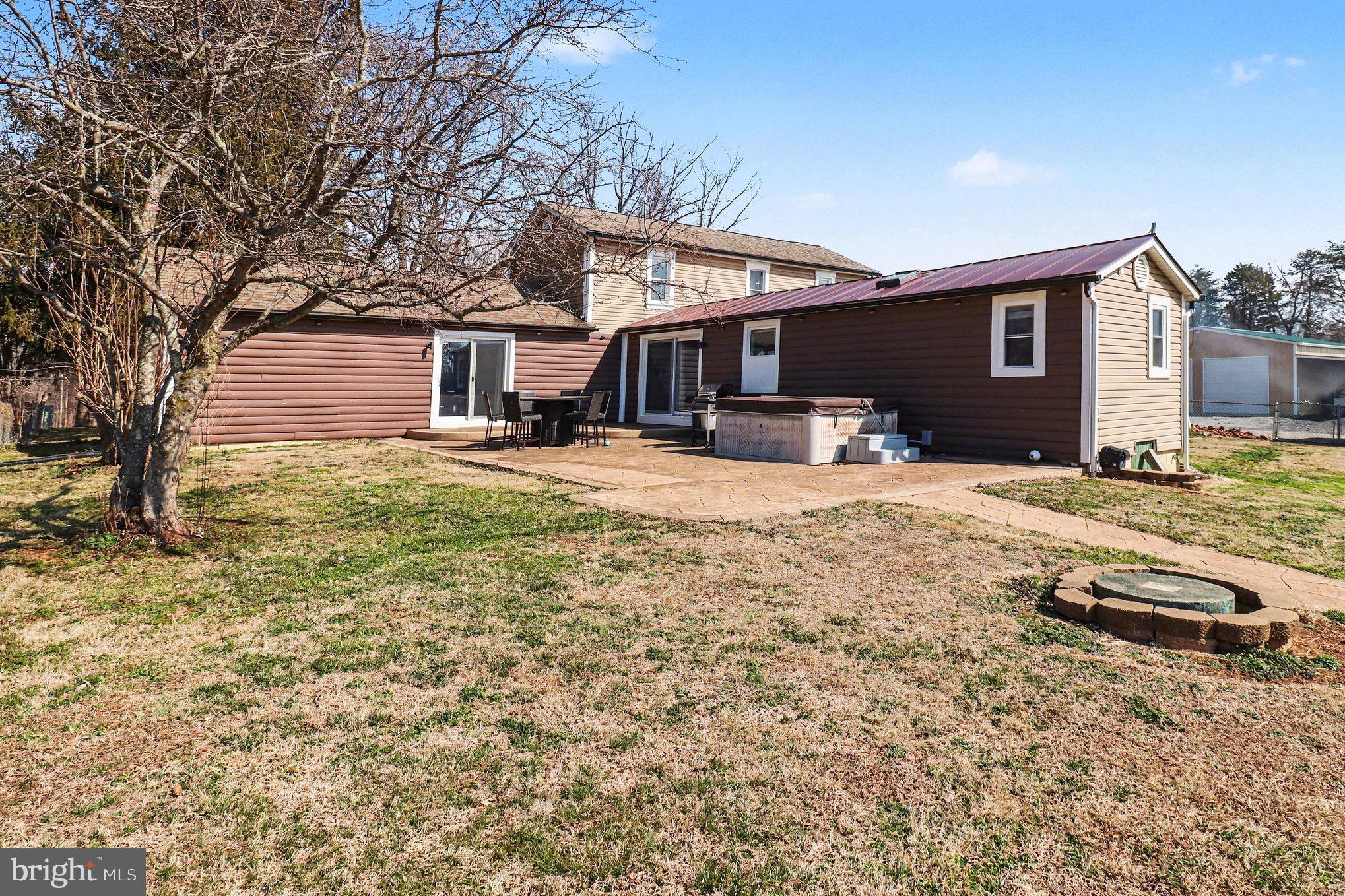 5408 Lewiston Road Spotsylvania, VA 22551 - Photo 18 of 32 a front view of a house with a yard covered in snow