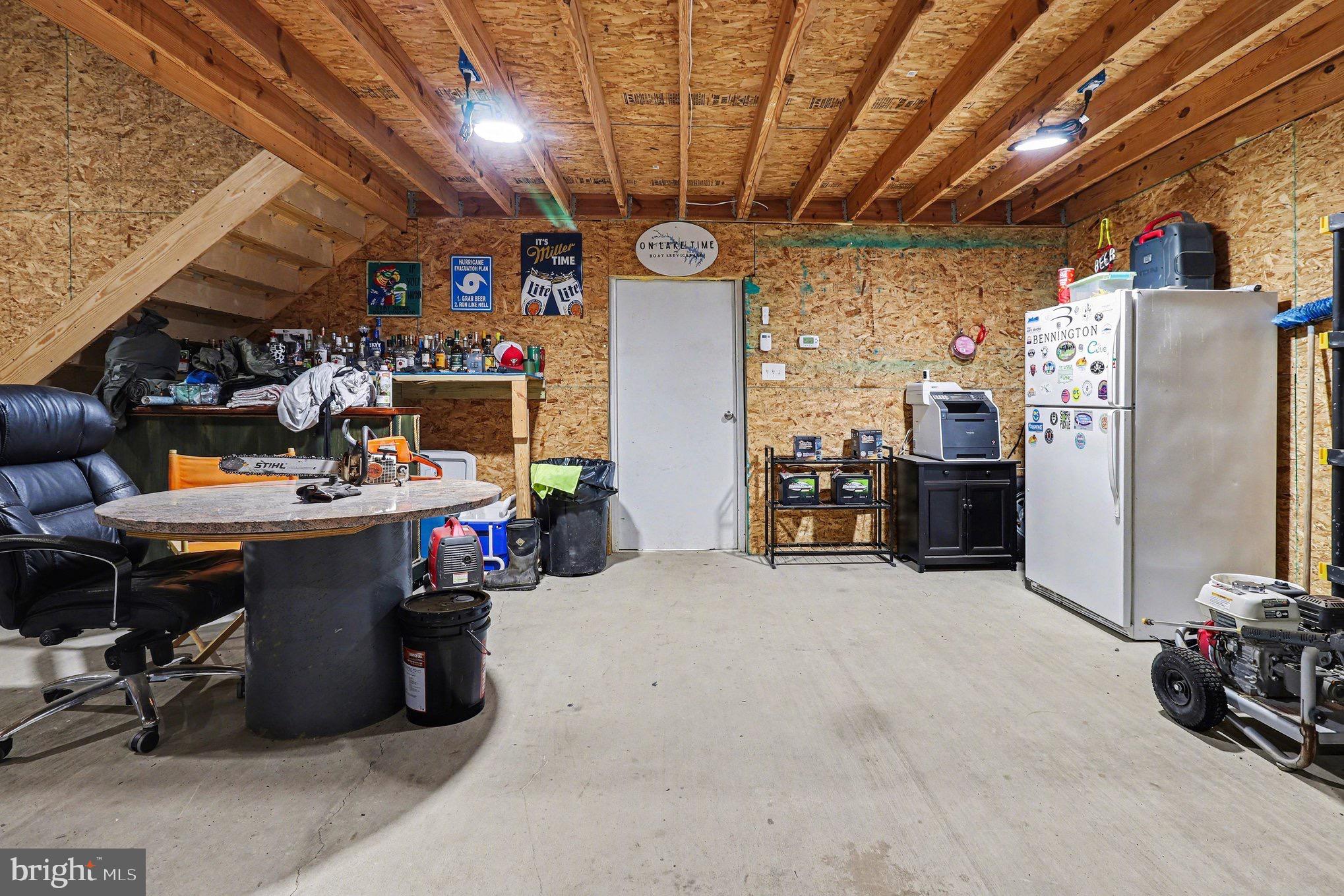 5408 Lewiston Road Spotsylvania, VA 22551 - Photo 20 of 32 a view of a storage room with a table and chairs