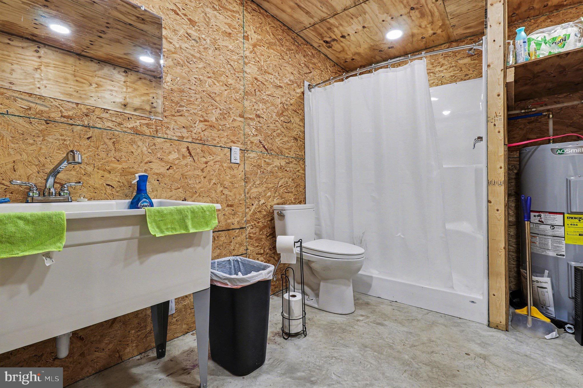5408 Lewiston Road Spotsylvania, VA 22551 - Photo 21 of 32 a bathroom with a toilet and shower