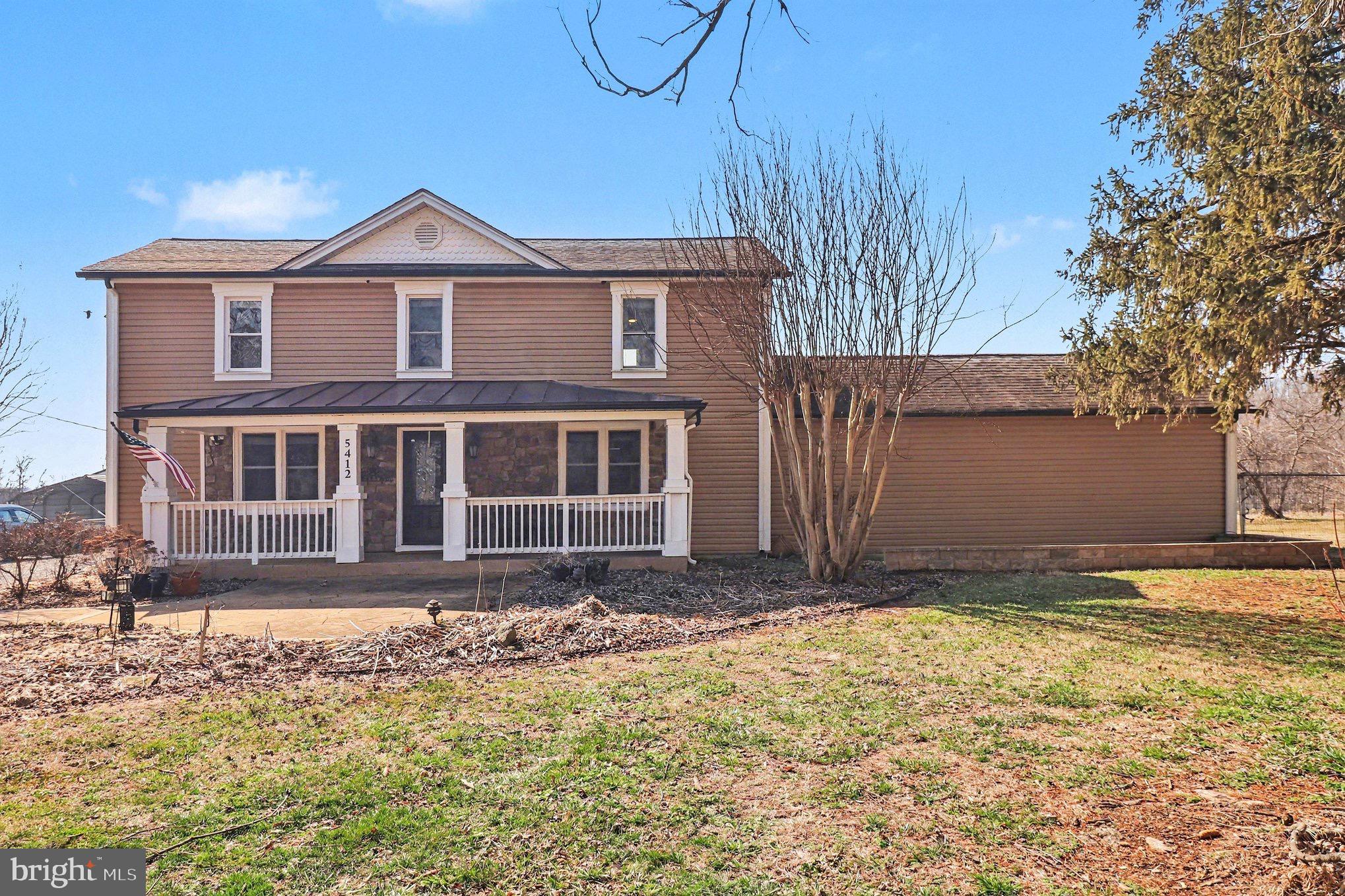 5408 Lewiston Road Spotsylvania, VA 22551 - Photo 27 of 32 a front view of a house with a yard