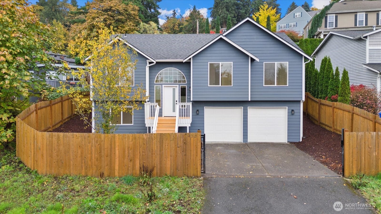 422 East Titus Street Kent, WA 98030 - Photo 1 of 28 a front view of a house with garden