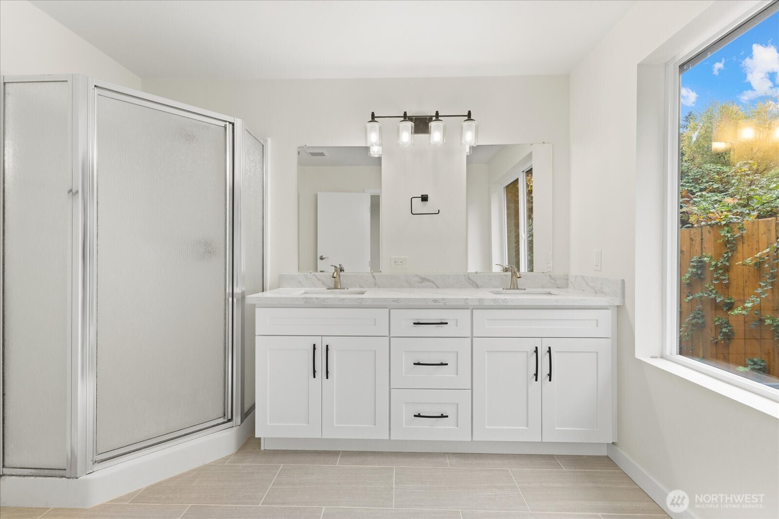 422 East Titus Street Kent, WA 98030 - Photo 18 of 28 a bathroom with a sink vanity and a mirror
