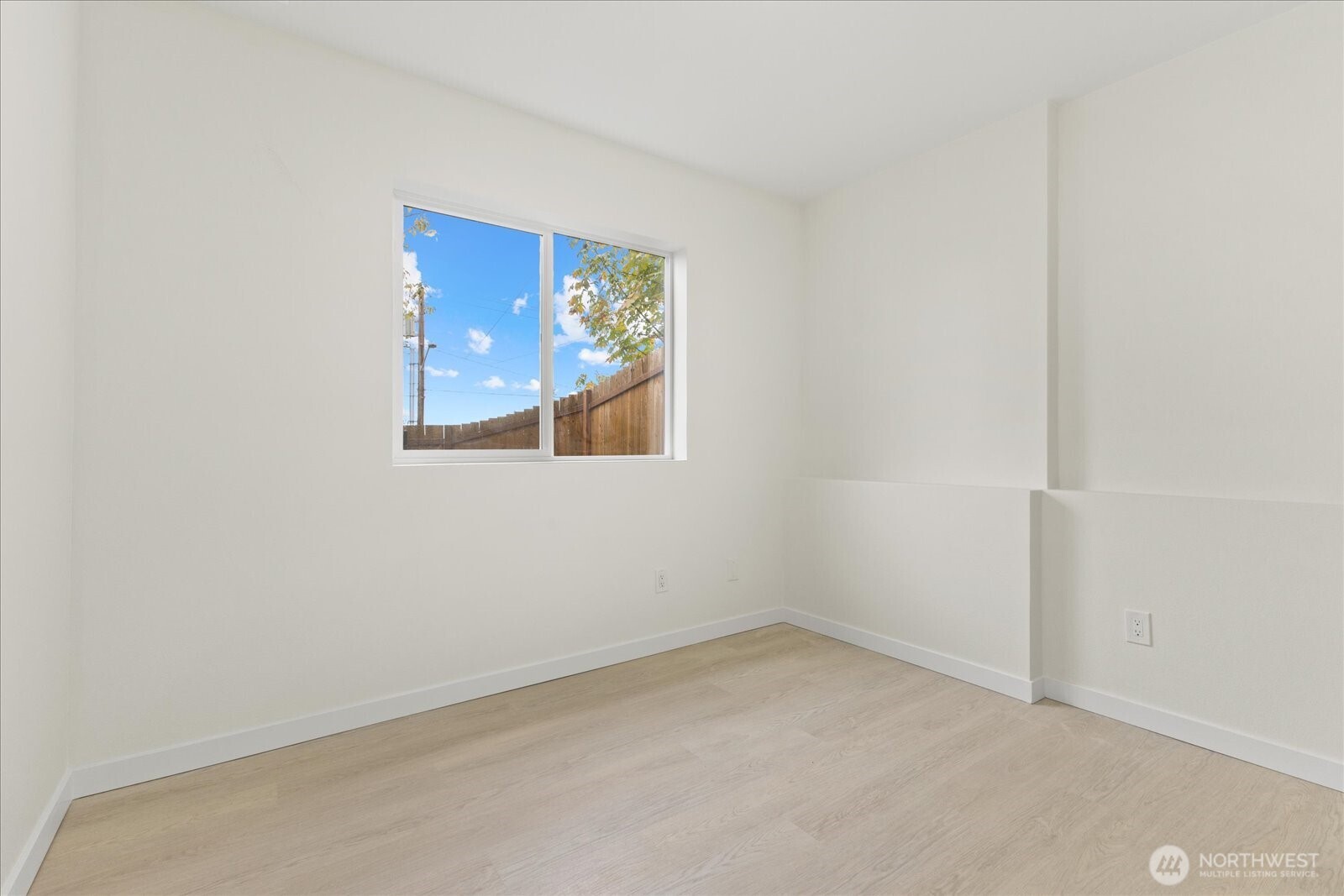 422 East Titus Street Kent, WA 98030 - Photo 21 of 28 a view of an empty room with a window